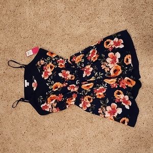 Xhiliration Romper size small, navy blue floral